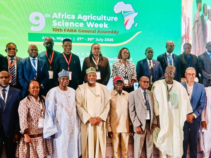 The Minister of Agriculture and Food Security, Sen Abubakar Kyari (C) and other stakeholders during the opening of Africa Agriculture Science Week.