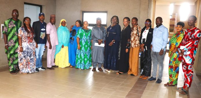 IMG-20260730-WA0093 The Director, Planning, Research and Statistics, Federal Ministry of Art, Culture, Tourism and Creative Economy (FMACTCE), Dr. Zainab C. Pisagih in a group photograph with some participants at the Performance Management Bond Implementation training, under PMS, today in Abuja.