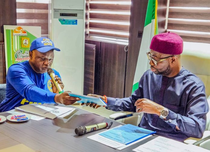 IMG-20260730-WA0167 The Honourable Minister of Humanitarian Affairs and Poverty Reduction. Dr. Bernard M Doro received the draft Memorandum of understanding from the Executive Secretary NCPWD Mr Ayuba Burki when the later paid him a courtesy visit in his office.