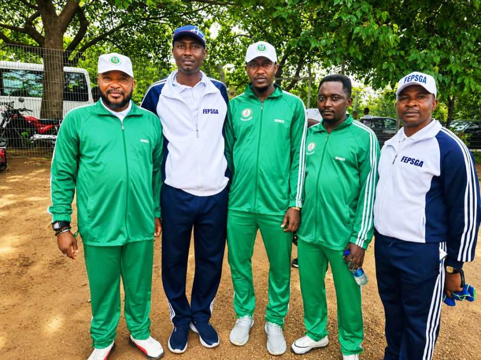 Representative of the NTAC Director-General, Nkem Anyata-Lafia (far left), poses with the National President of the Federal Public Service Games Association (FEPSGA), Comrade Amaebi Aloku (centre), alongside the Chairman of the NTAC Multipurpose Cooperative Society, Ogbonna Martin, and Mr. Jeremiah Indo of the NTAC Administration Department, at the venue of the event held at the Moshood Abiola National Stadium, Abuja, on Saturday, July 25, 2026.