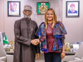 Minister of Solid Minerals Development, Mr. Dele Alake (left), with the Director-General/Chief Executive Officer of the National Identity Management Commission (NIMC), Engr. (Dr.) Abisoye Coker-Odusote, during a courtesy visit by the NIMC delegation to the Minister in Abuja.