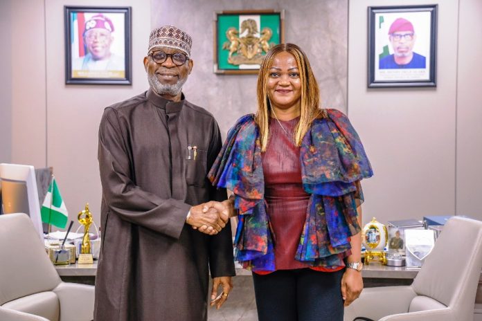 courtesy visit by the NIMC delegation Minister of Solid Minerals Development, Mr. Dele Alake (left), with the Director-General/Chief Executive Officer of the National Identity Management Commission (NIMC), Engr. (Dr.) Abisoye Coker-Odusote, during a courtesy visit by the NIMC delegation to the Minister in Abuja.