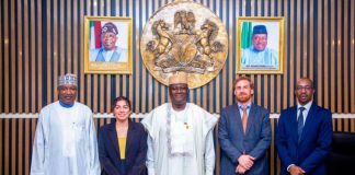 Secretary to the Government of the Federation, Sen. George Akume, CON, represented by the Permanent Secretary (GSO), Dr. Ibrahim Abubakar Kana, mni, (middle), flanked by the Leader of the Delegation/Global Assessor, Riley Zecca, (2nd right), Executive Secretary and National Coordinator of the Nigeria Extractive Industries Transparency Initiative (NEITI), Hon. Musa Sarkin Adar, (1st left) and other officials in a group photograph during the courtesy visit to the OSGF on Monday, 10th August, 2026 in Abuja.
