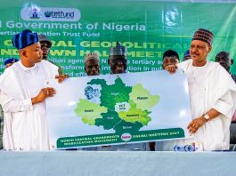 *2026 TETFUND NORTH CENTRAL ZONAL TOWN HALL MEETING* (L–R) Governor of Kogi State, His Excellency Ahmed Usman Ododo; former Governor of Kogi State, Captain Idris Wada; and Honourable Minister of Information and National Orientation, Mohammed Idris, fnipr, during the presentation of an endorsement card expressing the support of the North-Central geopolitical zone for President Bola Ahmed Tinubu and Vice President Kashim Shettima ahead of the 2027 general elections, at the 2026 TETFund North Central Zonal Town Hall Meeting on August 20, 2026, in Lokoja, Kogi State. Photo: Khalid Ahmed/FMINO