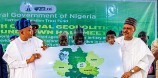 *2026 TETFUND NORTH CENTRAL ZONAL TOWN HALL MEETING* (L–R) Governor of Kogi State, His Excellency Ahmed Usman Ododo; former Governor of Kogi State, Captain Idris Wada; and Honourable Minister of Information and National Orientation, Mohammed Idris, fnipr, during the presentation of an endorsement card expressing the support of the North-Central geopolitical zone for President Bola Ahmed Tinubu and Vice President Kashim Shettima ahead of the 2027 general elections, at the 2026 TETFund North Central Zonal Town Hall Meeting on August 20, 2026, in Lokoja, Kogi State. Photo: Khalid Ahmed/FMINO