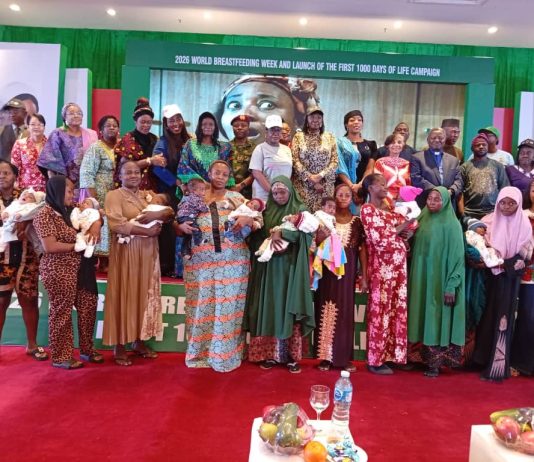 The Permanent Secretary, Federal Ministry of Health and Social Welfare, Daju Kachollum S. mni, supported by important personalities and nursing mothers at the 2026 World Breastfeeding Week commemoration.
