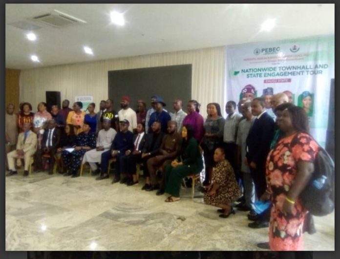 IMG-20260804-WA0122 Group photo of government officials and Organised Private Sector operators with PEBEC delegation who participated in the Town Hall meeting.