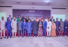 Honourable Minister of State for Health and Social Welfare Dr Iziaq Adekunle Salako (Center), flanked by his Left, Permanent Secretary Federal Ministry of Health and Social Welfare Daju Kachollom S. mni; and by his right is the Honourable Minister of Power, Mr. Joseph Olasunkanmi Tegbe, 2nd is by the right is Alhaji Mahmuda Mamman, Permanent Secretary, Federal Ministry of Power, supported by other members of the Nigeria Power for Health Initiative: Inter-ministerial Steering committee after the Third Meeting of the committee in Abuja.