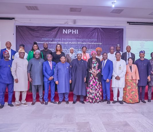 Honourable Minister of State for Health and Social Welfare Dr Iziaq Adekunle Salako (Center), flanked by his Left, Permanent Secretary Federal Ministry of Health and Social Welfare Daju Kachollom S. mni; and by his right is the Honourable Minister of Power, Mr. Joseph Olasunkanmi Tegbe, 2nd is by the right is Alhaji Mahmuda Mamman, Permanent Secretary, Federal Ministry of Power, supported by other members of the Nigeria Power for Health Initiative: Inter-ministerial Steering committee after the Third Meeting of the committee in Abuja.
