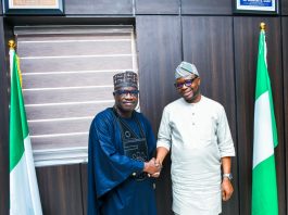 R-L: The Honourable Minister of Humanitarian Affairs and Poverty Reduction. Dr Bernard M.Doro in a warm handshake with the Kaduna state Commissioner for Humanitarian Affairs. Comrade Yunana Markus Barde during the courtesy visit in the Honourable. Minister's office.