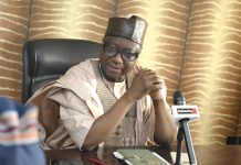 RMAFC Chairman Reaffirms Commitment To Transparency And Accountability The Chairman of RMAFC listening to the MD's remarks