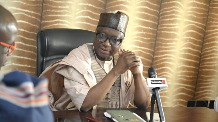 The Chairman of RMAFC listening to the MD's remarks