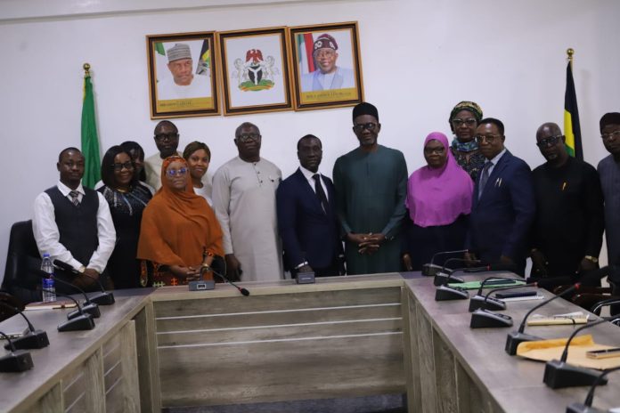IMG-20260807-WA0104 Fifth from Right: Representative of the Honourable Minister of Police Affairs Sen. Dr. Ibrahim Gaidam CON. Director Human Resources Management Mr. Ikemefuna Ohanyere in a group photograph with MPA Management and the facilitators from Deutsche Partners Holding Limited.