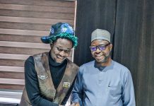 R- L : the Honourable Minister of Humanitarian Affairs and Poverty Reduction. Dr. Bernard M Doro in a handshake with the star IDP young man. OG Abbah when the delegation from IFON Youth Initiative visited the Minister in his office.