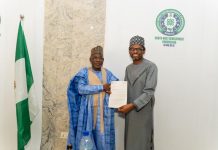 Bank of Industry Executive Director, Micro, Small and Medium Enterprises Mr. Oluwatoyin A. Edu, presenting a partnership proposal to the MD/CEO, NWDC Professor Shehu Abdullahi Ma'aji during a courtesy visit, Thursday in Kano.