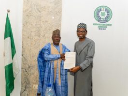 Bank of Industry Executive Director, Micro, Small and Medium Enterprises Mr. Oluwatoyin A. Edu, presenting a partnership proposal to the MD/CEO, NWDC Professor Shehu Abdullahi Ma'aji during a courtesy visit, Thursday in Kano.