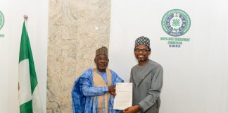 Bank of Industry Executive Director, Micro, Small and Medium Enterprises Mr. Oluwatoyin A. Edu, presenting a partnership proposal to the MD/CEO, NWDC Professor Shehu Abdullahi Ma'aji during a courtesy visit, Thursday in Kano.