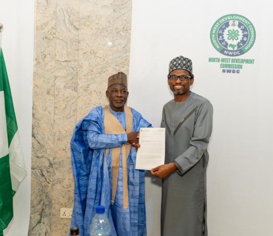 Bank of Industry Executive Director, Micro, Small and Medium Enterprises Mr. Oluwatoyin A. Edu, presenting a partnership proposal to the MD/CEO, NWDC Professor Shehu Abdullahi Ma'aji during a courtesy visit, Thursday in Kano.