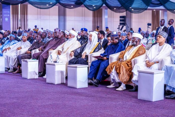 International Conference on Diversity and Social Peace (R–L) Honourable Minister of Information and National Orientation, Mohammed Idris, fnipr; National Chairman, Jama'atu Izalatil Bid'ah Wa'iqamatis Sunnah (JIBWIS), Sheikh Abdullah Bala Lau; Deputy President of the Senate, Senator Barau I. Jibrin, CFR; Secretary-General of the Muslim World League and Chairman of the Organization of Islamic Scholars, Sheikh Mohammed bin Abdulkarim Al-Issa; President-General of the Nigerian Supreme Council for Islamic Affairs (NSCIA) and Sultan of Sokoto, Alhaji Muhammad Sa'ad Abubakar III, CFR; National Chairman of the All Progressives Congress (APC), Prof. Nentawe Yilwatda; and other dignitaries, including the Governor of Kaduna State, Senator Uba Sani, and Governor of Jigawa State, Malam Umar Namadi, during the International Conference on Diversity and Social Peace for a Promising Future on August 11, 2026, in Abuja. Photo: Khalid Ahmed/FMINO.