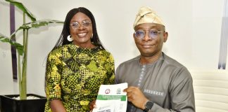Director-General/CEO, Bureau of Public Procurement (BPP), Dr. Adebowale A. Adedokun, FCIPS, right, being presented with a copy of the Nigerian Council of Food Science and Technology (NiCFoST) document by the Registrar/CEO, Mrs. Veronica Eze during her visit to the BPP in Abuja.