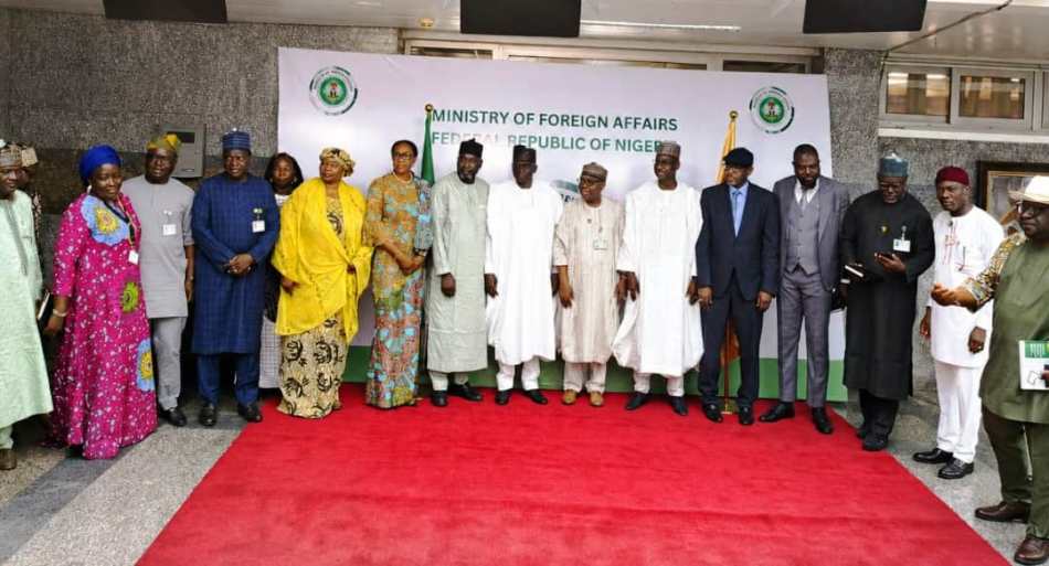 HON. MINISTER OF STATE FOR FOREIGN AFFAIRS, AMB. SOLA ENIKANOLAIYE (M), WITH DG, NTAC, RT. HON. YUSUF BUBA YAKUB (R), PERM. SEC., DR. DUNOMA UMAR AHMED (L), NTAC MANAGEMENT AND MFA STAFF, DURING THE NTAC VISIT, 30TH JULY 2026.