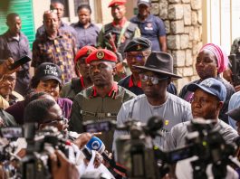 Minister's representatives- Director, Mines Inspectorate, Engr Imam Ganiyu(right), Director, Special Duties, Engr Frank Odom, (middle) and Commander, Mining Marshals, Attah Onoja listening to protester at the Ministry of Solid Minerals Development, Abuja on Thursday