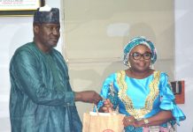 SERVICOM Calls For Enhanced Service Delivery Standards In Nigeria’s Aviation Sector The Ag. National Coordinator/CEO of the SERVICOM Office, Mrs. Helen Lawal presenting some awareness materials to the Permanent Secretary, Federal Ministry of Aviation and Aerospace Development, Mr. Mahmud Adam Kambari FCNA, FICA, during the courtesy visit to the Ministry’s Headquarters in Abuja on 3rd September, 2026.