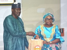 The Ag. National Coordinator/CEO of the SERVICOM Office, Mrs. Helen Lawal presenting some awareness materials to the Permanent Secretary, Federal Ministry of Aviation and Aerospace Development, Mr. Mahmud Adam Kambari FCNA, FICA, during the courtesy visit to the Ministry’s Headquarters in Abuja on 3rd September, 2026.