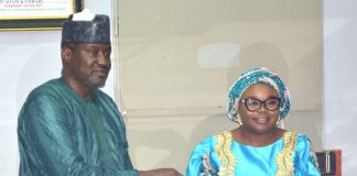 The Ag. National Coordinator/CEO of the SERVICOM Office, Mrs. Helen Lawal presenting some awareness materials to the Permanent Secretary, Federal Ministry of Aviation and Aerospace Development, Mr. Mahmud Adam Kambari FCNA, FICA, during the courtesy visit to the Ministry’s Headquarters in Abuja on 3rd September, 2026.