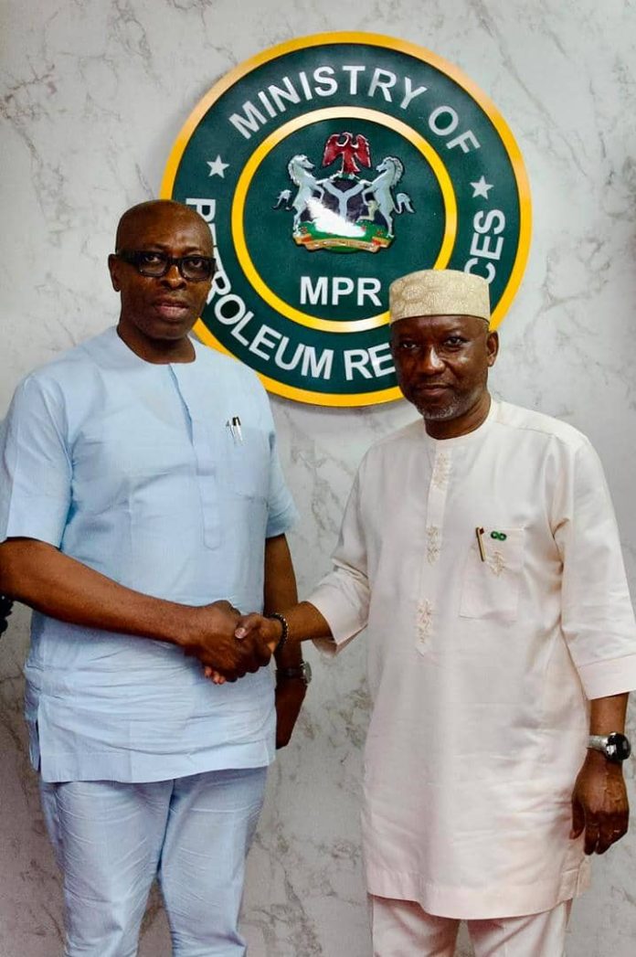 L-R: The  Chairman of the  Investment Monitoring Committee and Federal Commissioner representing Anambra State in RMAFC, Dr. Ekene Enefe and Honourable Minister of State for Petroleum Resources (Gas), Rt. Hon. Obongemem Ekperikpe Ekpo; during the courtesy visit to the Ministry of Petroleum Resources.
