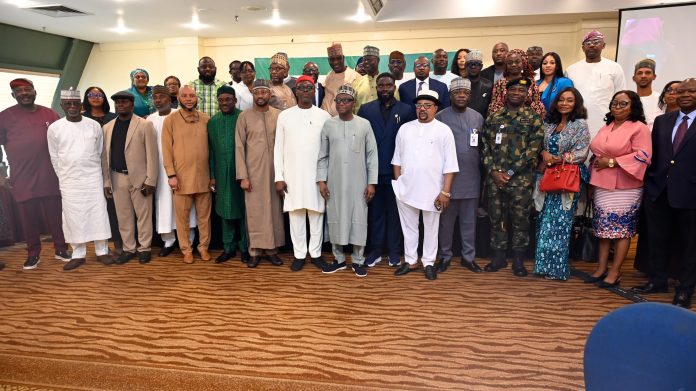 8th-R: The Honourable Chairman of RMAFC, Dr. Mohammed Bello Shehu OFR, and other stakeholders during the engagement.
