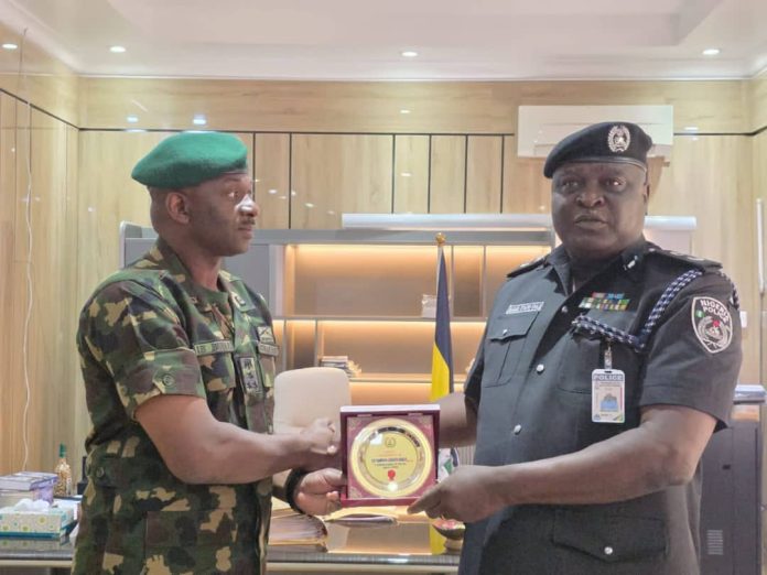 IMG-20260916-WA0014 L-R: Brigadier General Ibrahim Buhari, Commander 63 Brigade And CP. Samuel Etaifo Erale psc mnips, CP Delta State Police Command Asaba During The Visit To CP's Office.