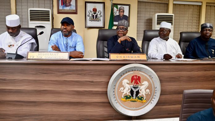 Middle: RMAFC Chairman, Dr. Mohammed Bello Shehu, OFR; 1st L: Hon. Amosun Akeem Akintayo, FC Ogun State; 2nd L: Secretary to the Commission, Comrade Tosin Adeyanju; 2nd R: Hon. Adamu Abdu Fanda, FC Kano State and Chairman, Crude Oil Monitoring Committee; 1st R: Hon. Oladele Gboyega, FC Osun State.