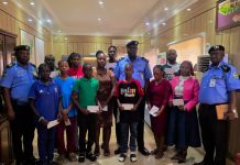 Delta: Police Arrest Six Suspected Cultists CP. Samuel Etaifo Erale psc mnips And Two Of His Mgt. Team In A Group Photograph With Family Members Of The Deceased Officers And Recipients OF The Cheques