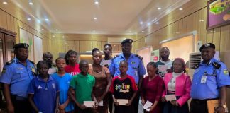 CP. Samuel Etaifo Erale psc mnips And Two Of His Mgt. Team In A Group Photograph With Family Members Of The Deceased Officers And Recipients OF The Cheques