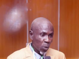 Dr. Ibrahim Ishaq delivering the opening remarks on behalf of the Administrator/CEO, PSIN, Barr. Imeh Okon, during the training.