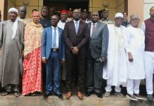 Members of the independent investigative Committee in a Group Photograph with the Hon Minister of Interior, Dr Olubunmi Tunji-Ojo, druing the inauguration.