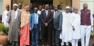 Members of the independent investigative Committee in a Group Photograph with the Hon Minister of Interior, Dr Olubunmi Tunji-Ojo, druing the inauguration.