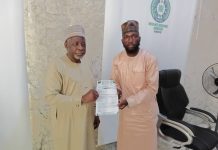 The Chairman Nigeria Medica Students Association (NIMSA) Northern Caucus, Khalifa Abdullahi Dahiru presenting letter of request for assistance to the MD/CEO North-West Development Commission (NWDC), Prof. Shehu Abdullahi Ma'aji during a courtesy visit to the Commission Headquarters in Kano.