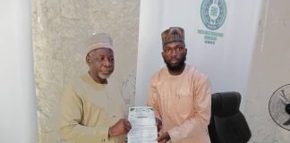 The Chairman Nigeria Medica Students Association (NIMSA) Northern Caucus, Khalifa Abdullahi Dahiru presenting letter of request for assistance to the MD/CEO North-West Development Commission (NWDC), Prof. Shehu Abdullahi Ma'aji during a courtesy visit to the Commission Headquarters in Kano.