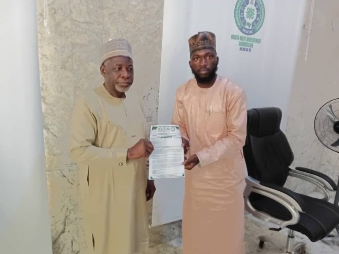 The Chairman Nigeria Medica Students Association (NIMSA) Northern Caucus, Khalifa Abdullahi Dahiru presenting letter of request for assistance to the MD/CEO North-West Development Commission (NWDC), Prof. Shehu Abdullahi Ma'aji during a courtesy visit to the Commission Headquarters in Kano.