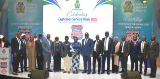 R – L, Director, Risk Management Department CBN, Dr. Blaise Ijebor (8th), Ag. National Coordinator/CEO of the SERVICOM Office, Mrs. Helen Lawal (9th) and Ag. Director, Special Duties CBN, Mr. Ishiaku Polycarp (10th) in a group photograph with other directors and other Management Staff during the celebration of the 2026 Customer Service Week at the bank headquarters in Abuja.