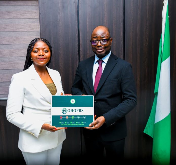 R-L Hon. Minister of Humanitarian Affairs and Poverty Reduction. Dr. Bernard M. Doro and Hon. Bridget Anne Afor. Sweden Rep. at the European Union Committee of the Regions, when she paid a courtesy visit to the minister in his office.