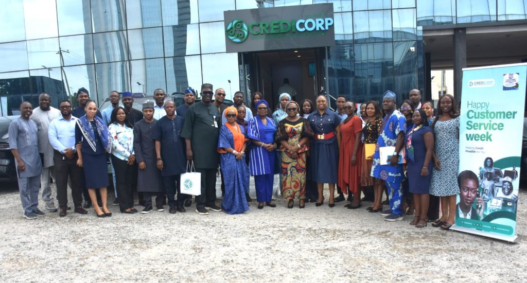 Ag. National Coordinator/CEO of the SERVICOM Office, Mrs. Helen Lawal in a group photograph with management and staff of the Nigerian Consumer Credit Corporation (CREDICORP) during the 2026 International Customer Service Week celebration on 7th October, 2026 in Abuja.