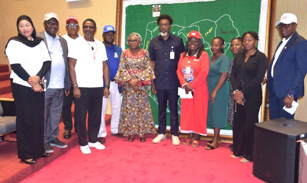 L-R; Director-Customer Service Medium and Emerging Taxpayers Department, Nigeria Revenue Service (NRS) Mr. Titus Ayeni (4th), Ag. Director SERVICOM Department, Mr. Mannir Haruna (5th), Ag. National Coordinator/CEO of the SERVICOM Office, Mrs. Helen Lawal (6th), Representative of the Executive Chairman NRS and the Chief of Staff, Mr. Tayo Koleosho (7th) and SA to the Executive Chairman NRS on customer centricity, Yeye Adesola Oyinloye-Ndu (8th) in a group photograph with other dignitaries during the presentation of the hand-knitted crocheted map of Nigeria to the representative of the Executive Chairman by Yeye Adesola Oyinloye-Ndu