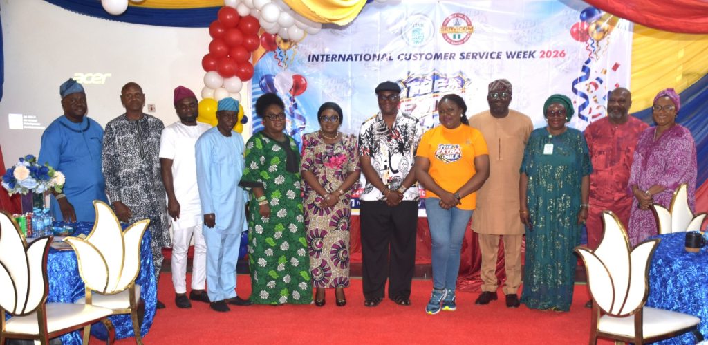 R-L, Ag. National Coordinator/CEO of the SERVICOM Office, Mrs. Helen Lawal (7th) in a group photograph with directors, management staff of NIMC and SERVICOM Presidency Team during her tour of the 2026 International Customer Service Week at the National Identity Management Commission (NIMC) on 9th October, 2026 in Abuja.