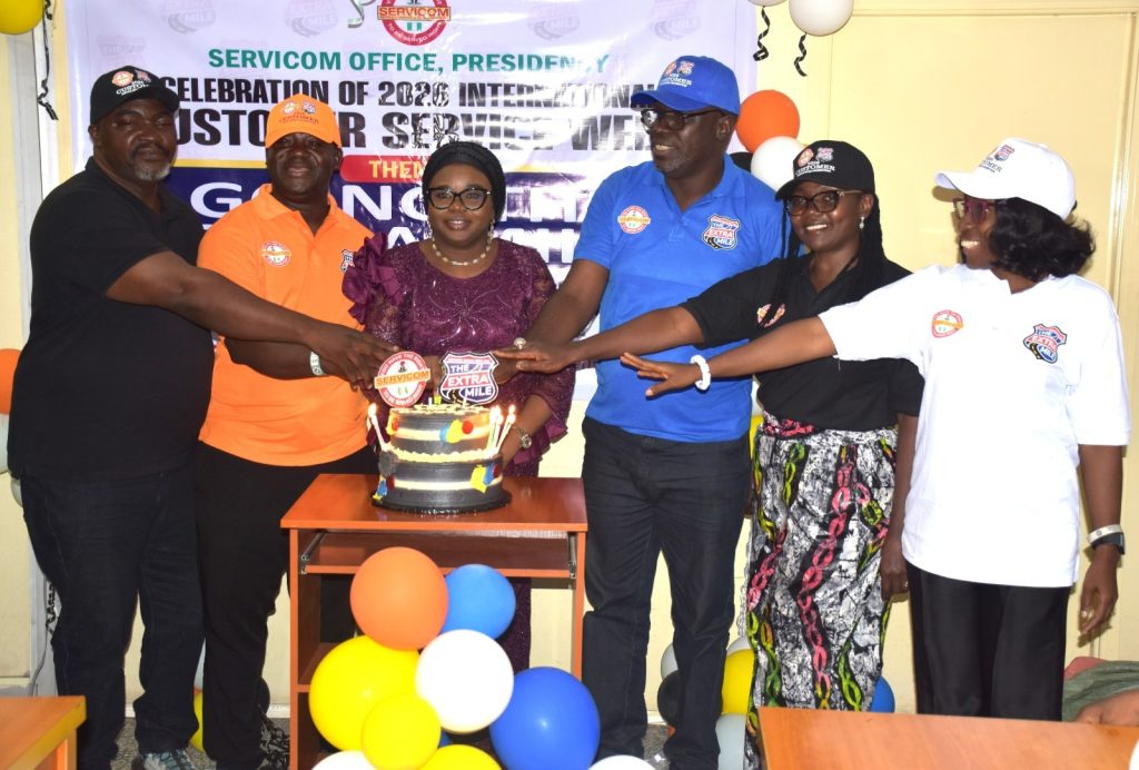 Ag. National Coordinator/CEO of the SERVICOM Office, Mrs. Helen Lawal in a group photograph with the Management Team of SERVICOM Presidency, during the Grand finale of the 2026 Customer Service Week celebrations on 13th, October, 2026 in Abuja.