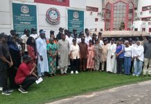 Ag. National Coordinator/CEO of the SERVICOM Office, Mrs. Helen Lawal and Deputy Executive Secretary Technical, Mr. Rasaq Olajuwon Akinyemi in a group photograph with Management and staff of Universal Basic Education Commission (UBEC), during the celebration of 2026 Customer Service Week on 14th, October, 2026 in Abuja.