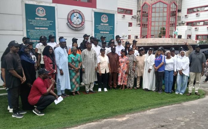 Ag. National Coordinator/CEO of the SERVICOM Office, Mrs. Helen Lawal and Deputy Executive Secretary Technical, Mr. Rasaq Olajuwon Akinyemi in a group photograph with Management and staff of Universal Basic Education Commission (UBEC), during the celebration of 2026 Customer Service Week on 14th, October, 2026 in Abuja.