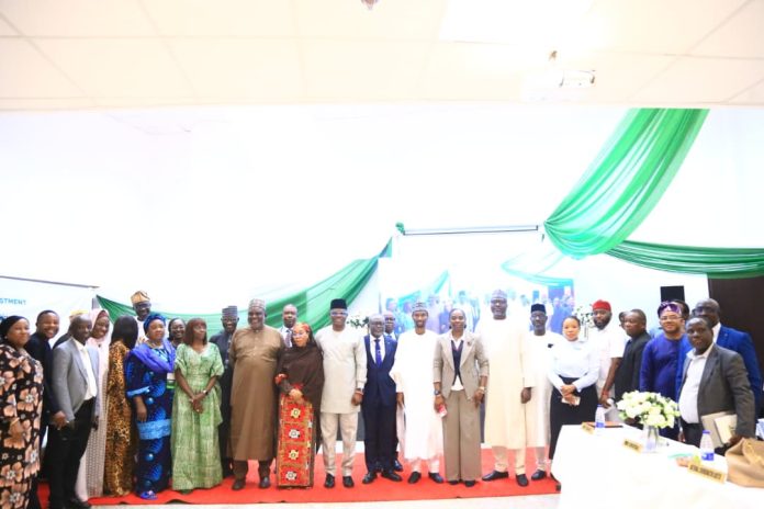 The Perm. Sec. FMITI Dr. Chris Osa Isokpunwu, Directors of FMITI and CEOs of the Agencies under FMITI, in a group photograph after their quarterly Management meeting on Wednesday 14/10/26.
